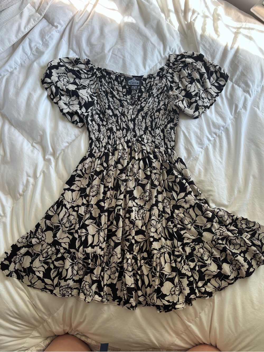 Angie Black and White smocked bodice mini dress, size M but fits like XS/S